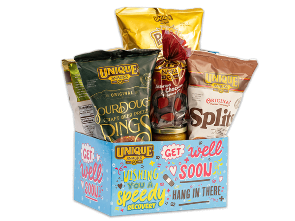 Unique snacks bundle box that is blue with get well soon written in pink, hang in there written in brown, and wishing you a speedy recovery in yellow and green, it contains sourdough rings, honey mustard dip, original splits and others