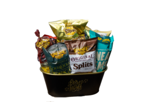 Green Tin Basket with gold trim Merry and Bright written on front of tin.