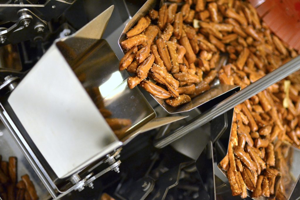 Pretzel Shells moving down the package line and into the scale