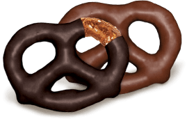 Two chocolate coated pretzels