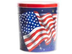 Star Spangled pretzel tin, blue background with multi-color fireworks and a large american flag in the middle, it has a red lid