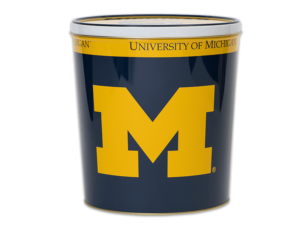 Michigan University pretzel tin, yellow Michigan M on tin on dark blue background, University of Michigan text around top of tin on yellow background