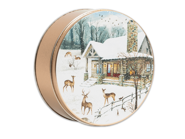 Cabin in the Woods 24 count gold tin with a snow scenery that has a house and deer outside the house standing in the snow