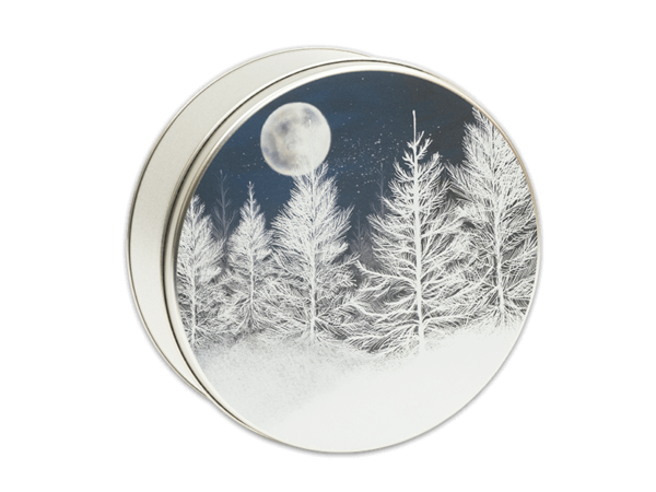Arctic Moon 40-count tin, white silhouettes of pine trees with a full moon in the night sky
